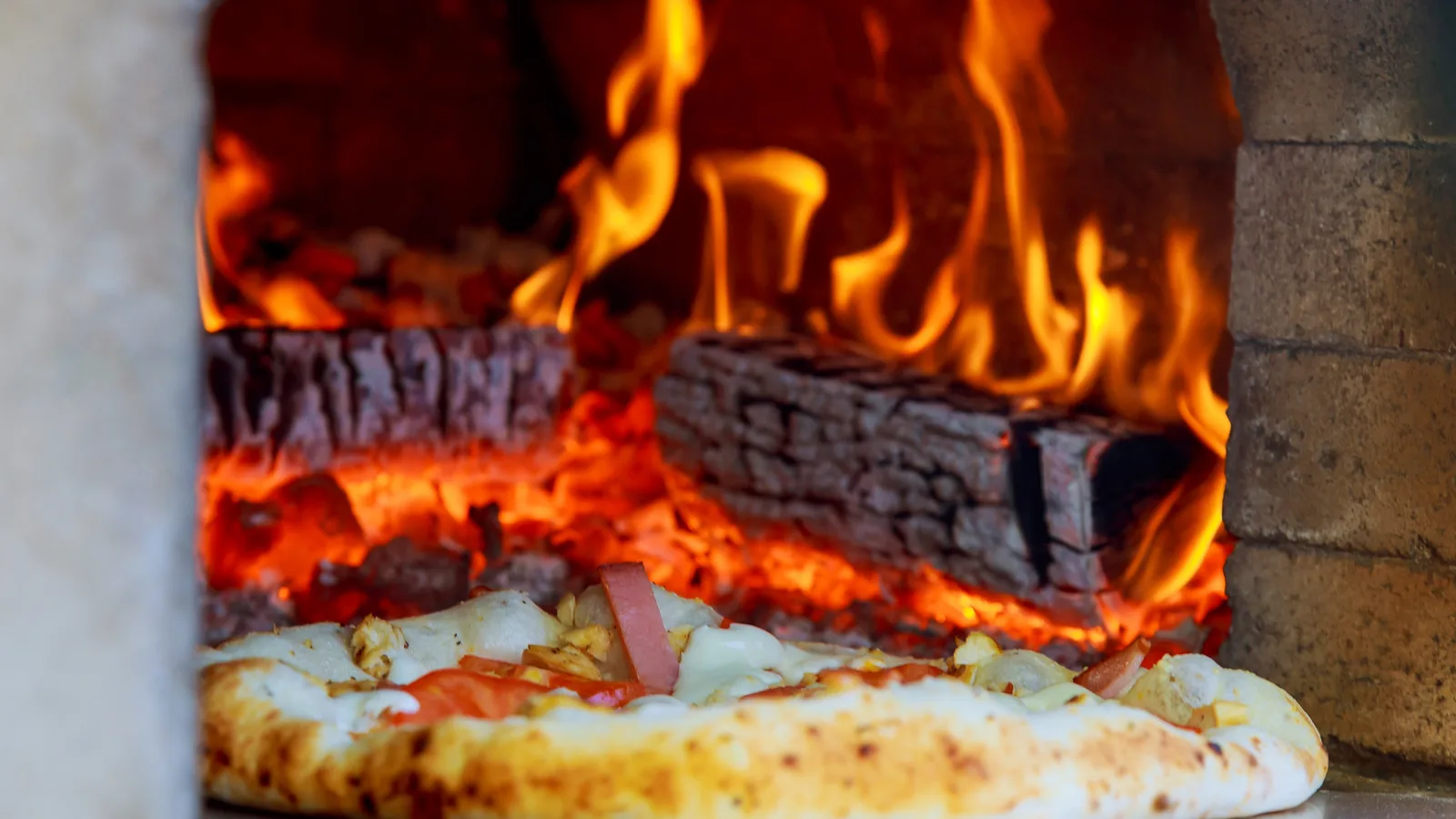 Nunzio's Pizza Town Went Dark After 50 Years. The New Filing at Its Address Says Home of the Crust.